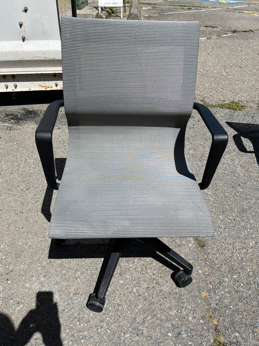 Rolling gray mesh conference room chairs