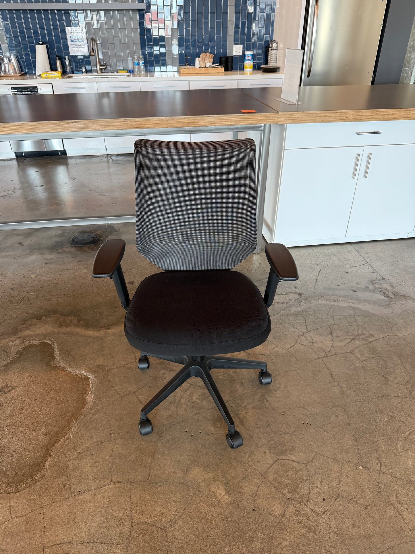 Black mesh chair adjustable arms and recline
