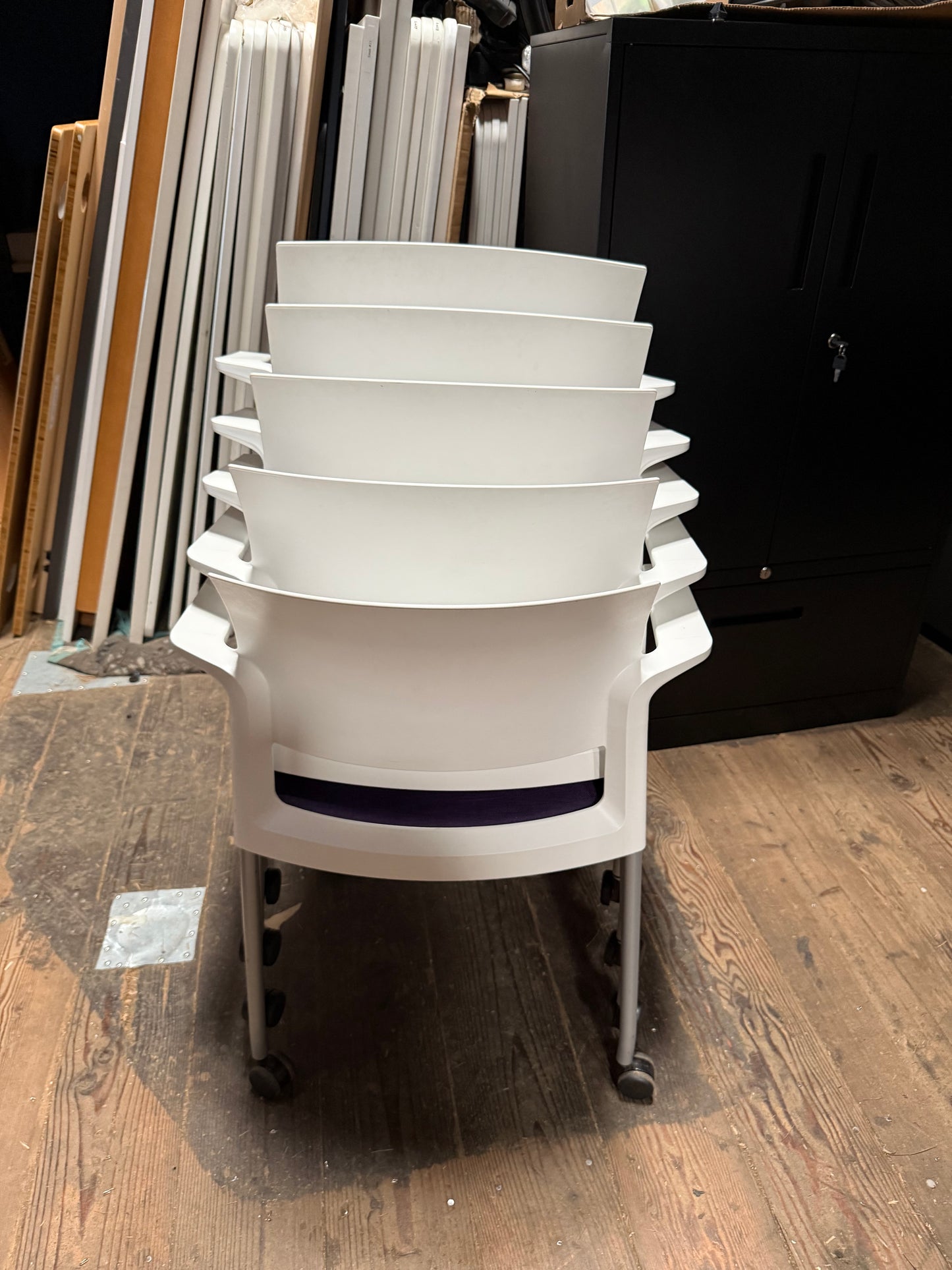 Steelcase rolling stacking chairs purple and white