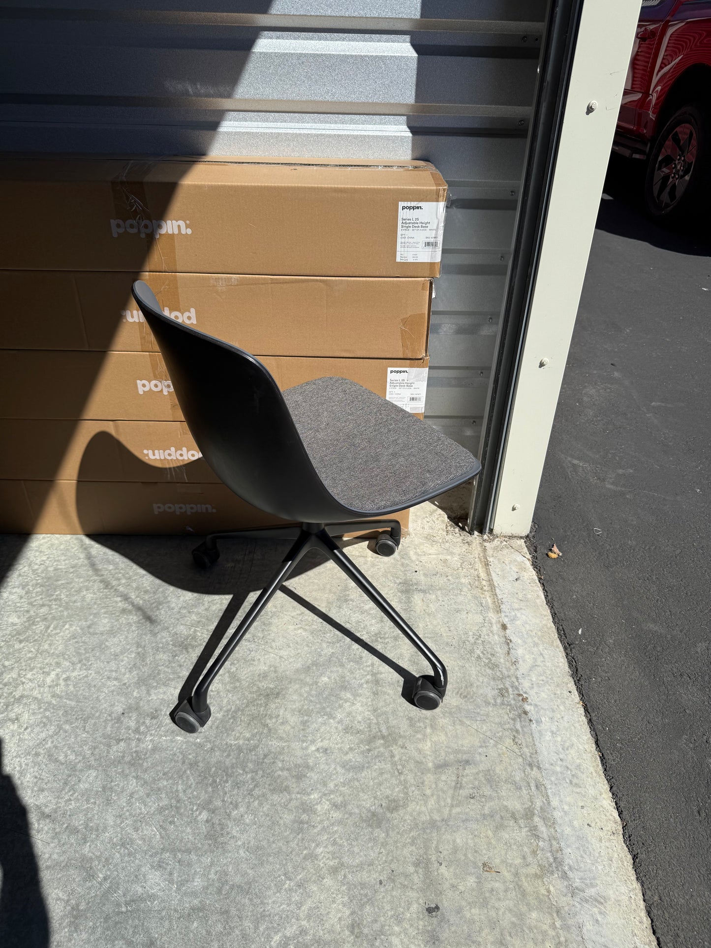 Gray rolling conference chairs with padding