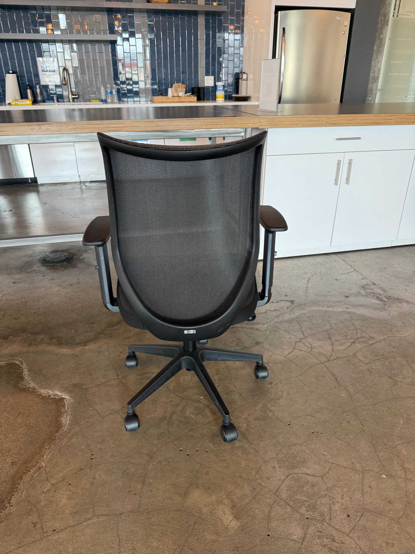 Black mesh chair adjustable arms and recline
