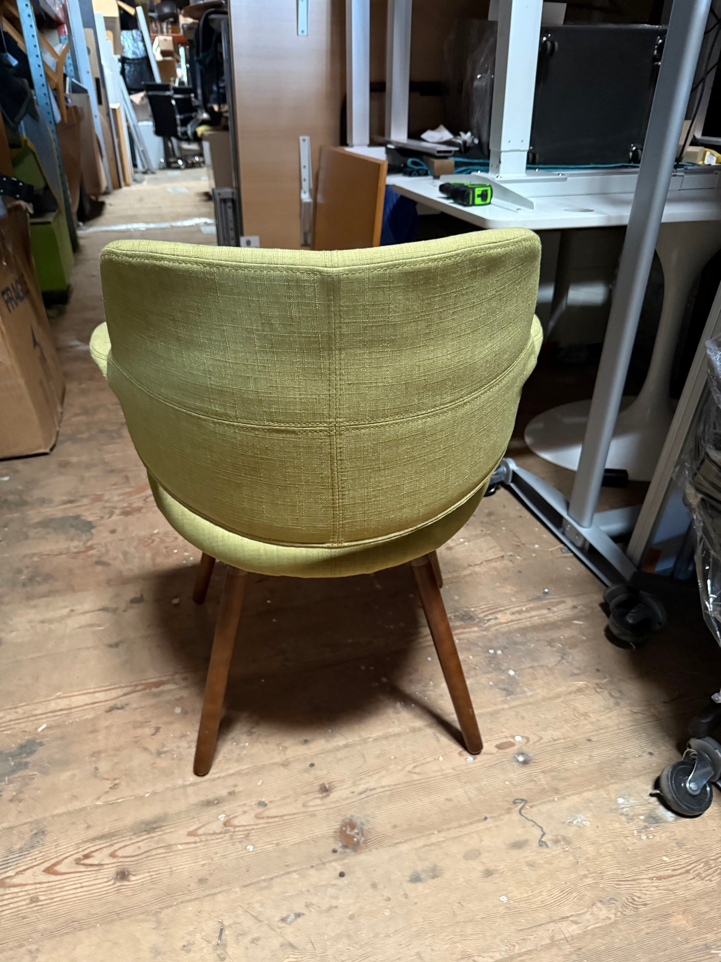 Green upholstered bucket chairs
