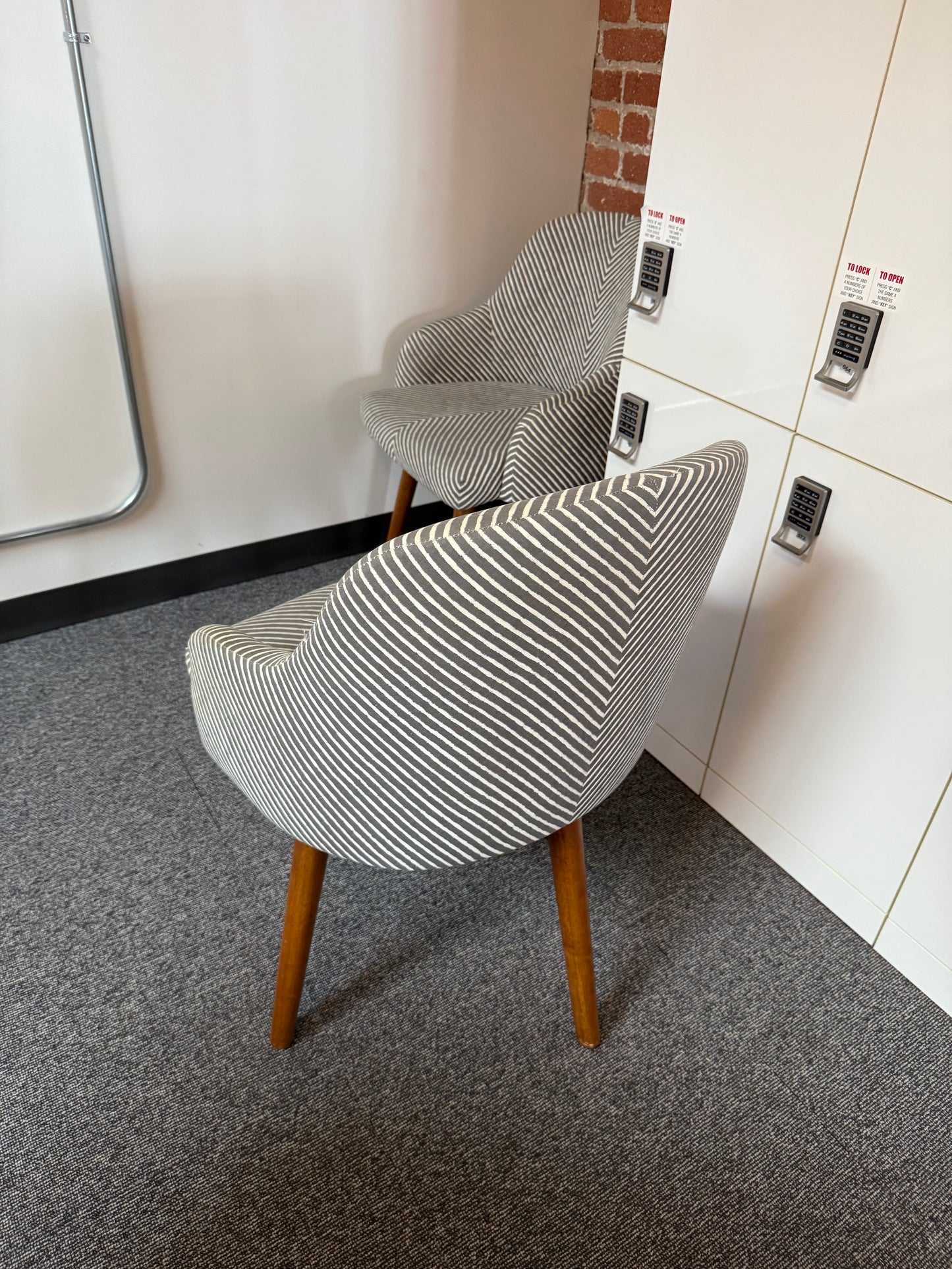 Striped west elm swivel chairs