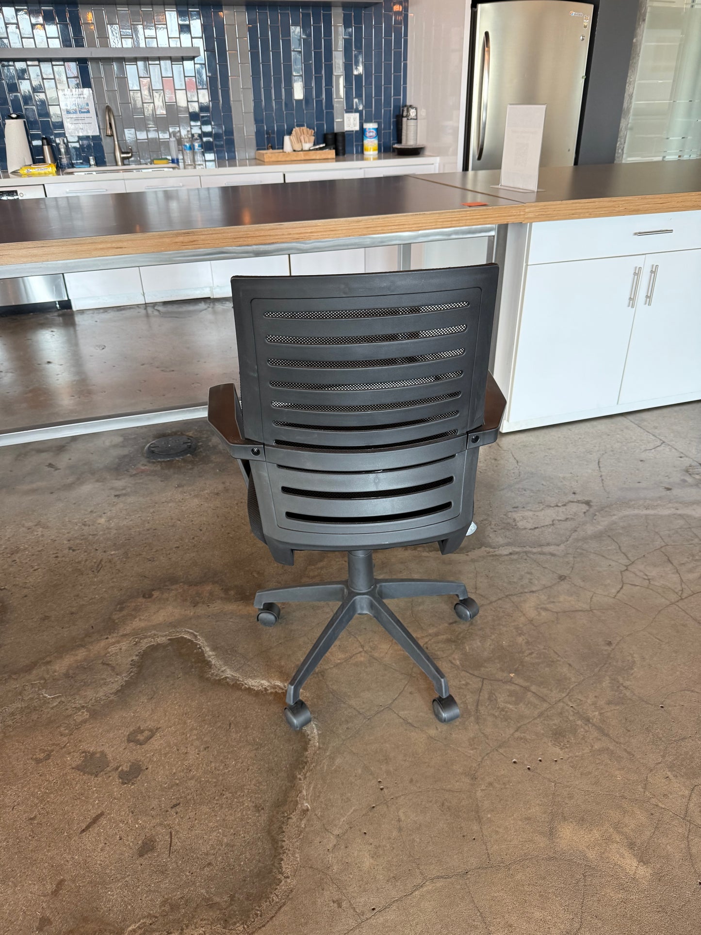 Black mesh chairs fixed arms