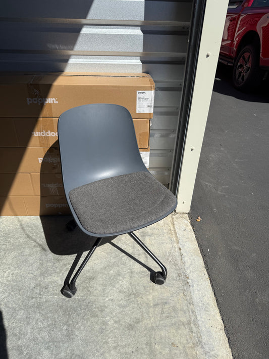 Gray rolling conference chairs with padding
