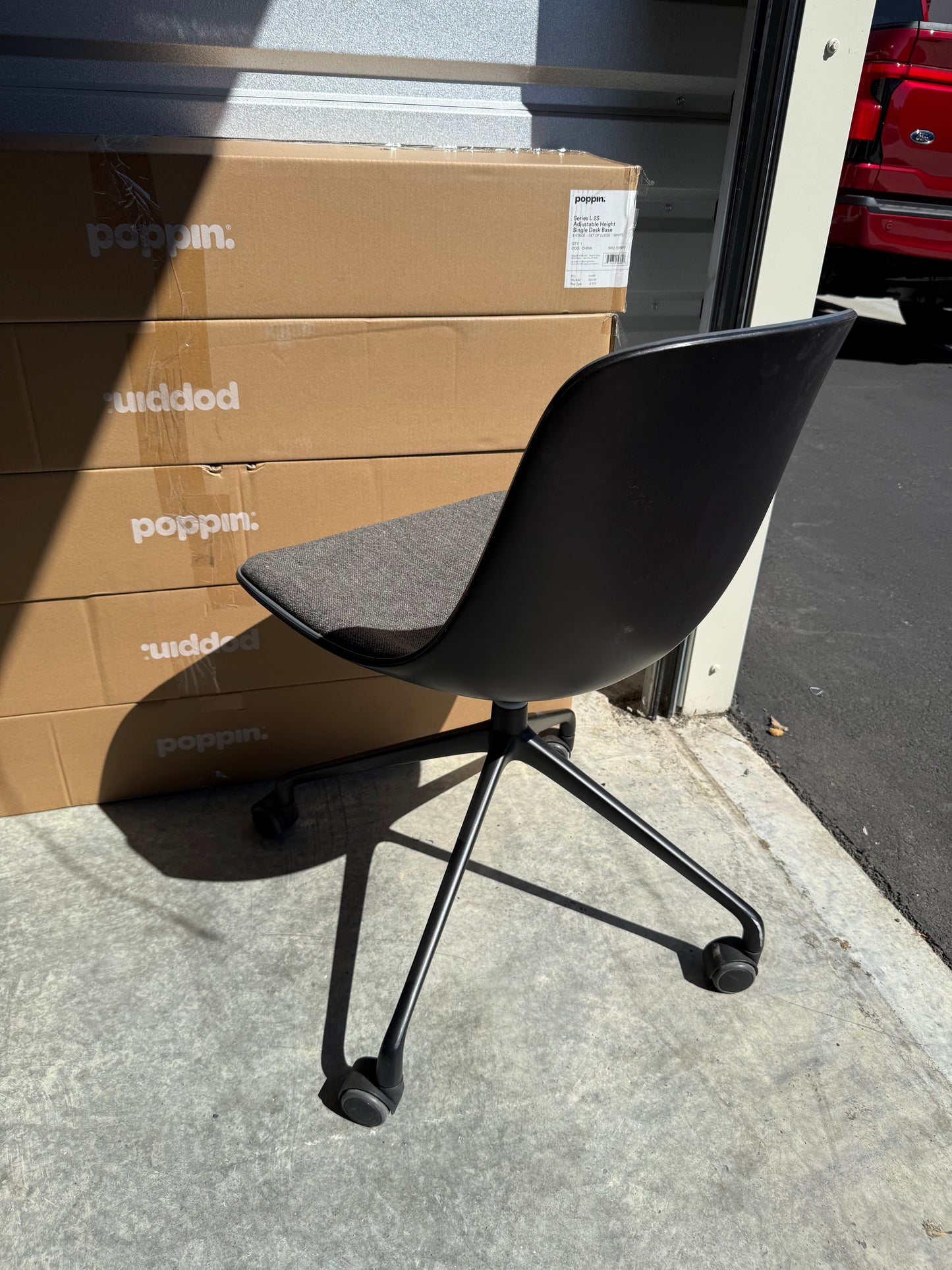 Gray rolling conference chairs with padding