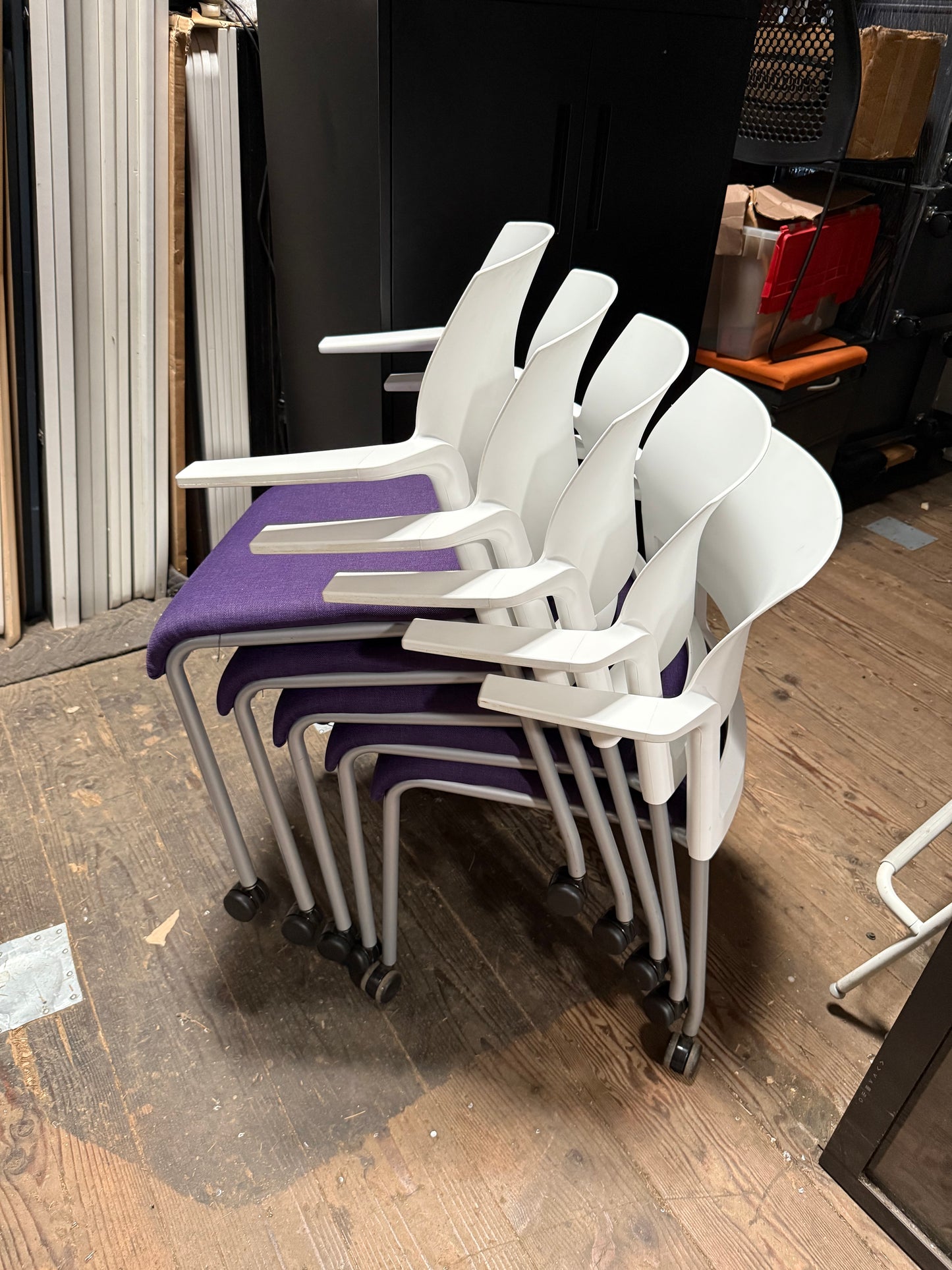 Steelcase rolling stacking chairs purple and white