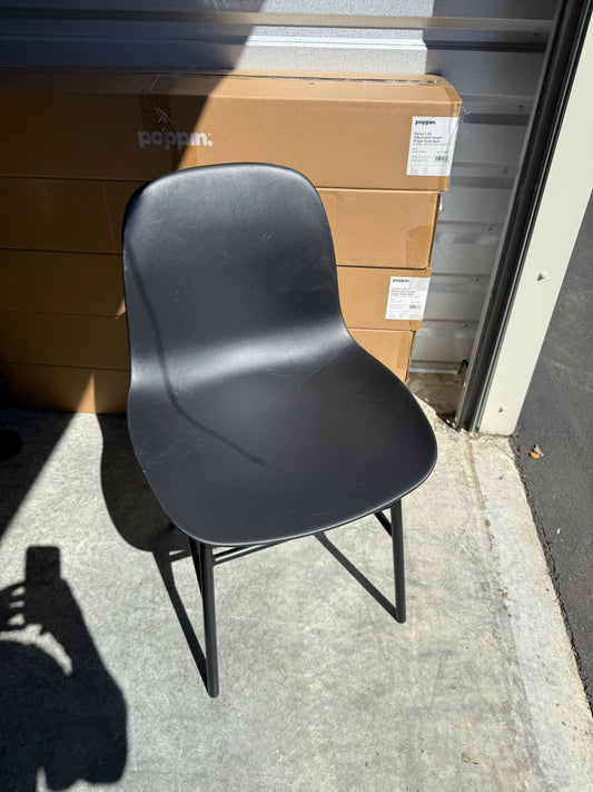 Normann Copenhagen black chairs