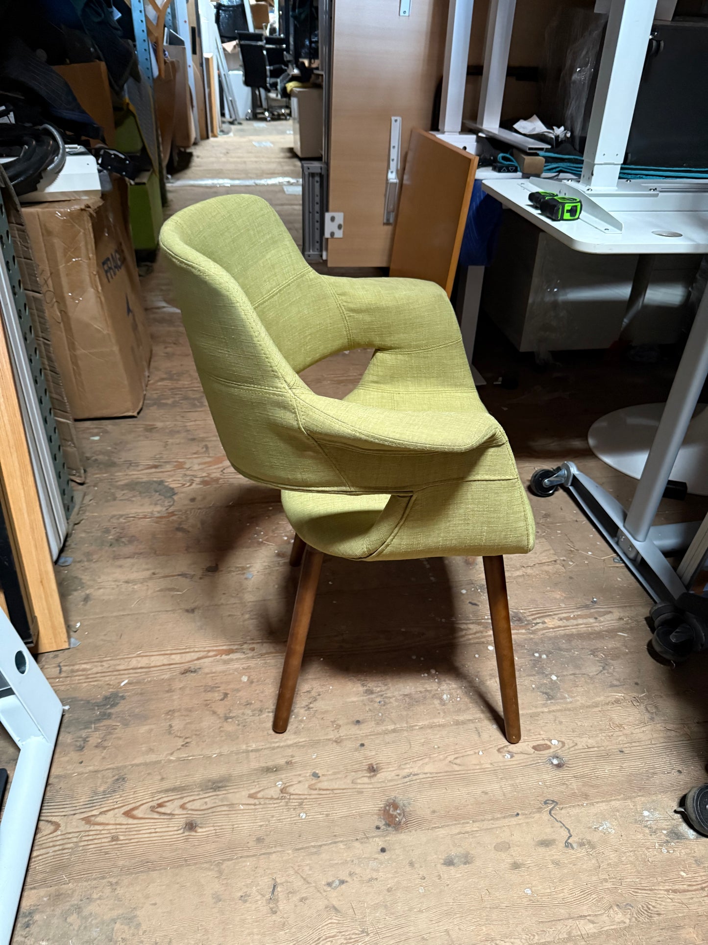 Green upholstered bucket chairs