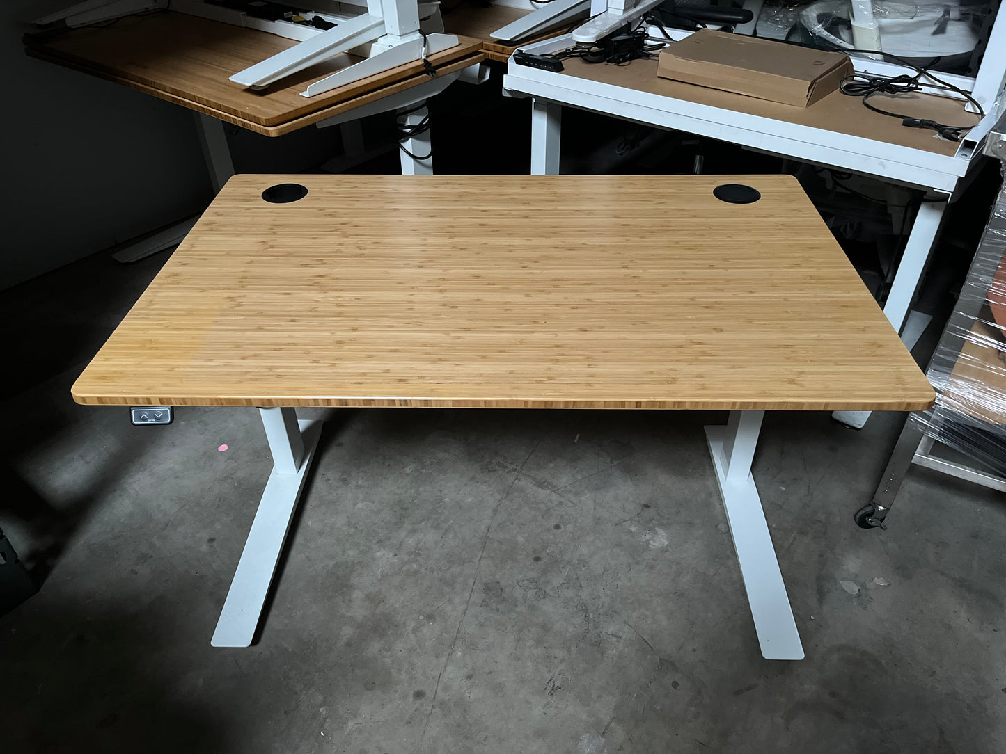 Fully Jarvis brand sit stand desks 48x30 white frame bamboo top