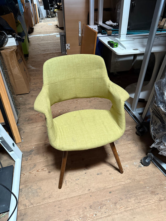Green upholstered bucket chairs