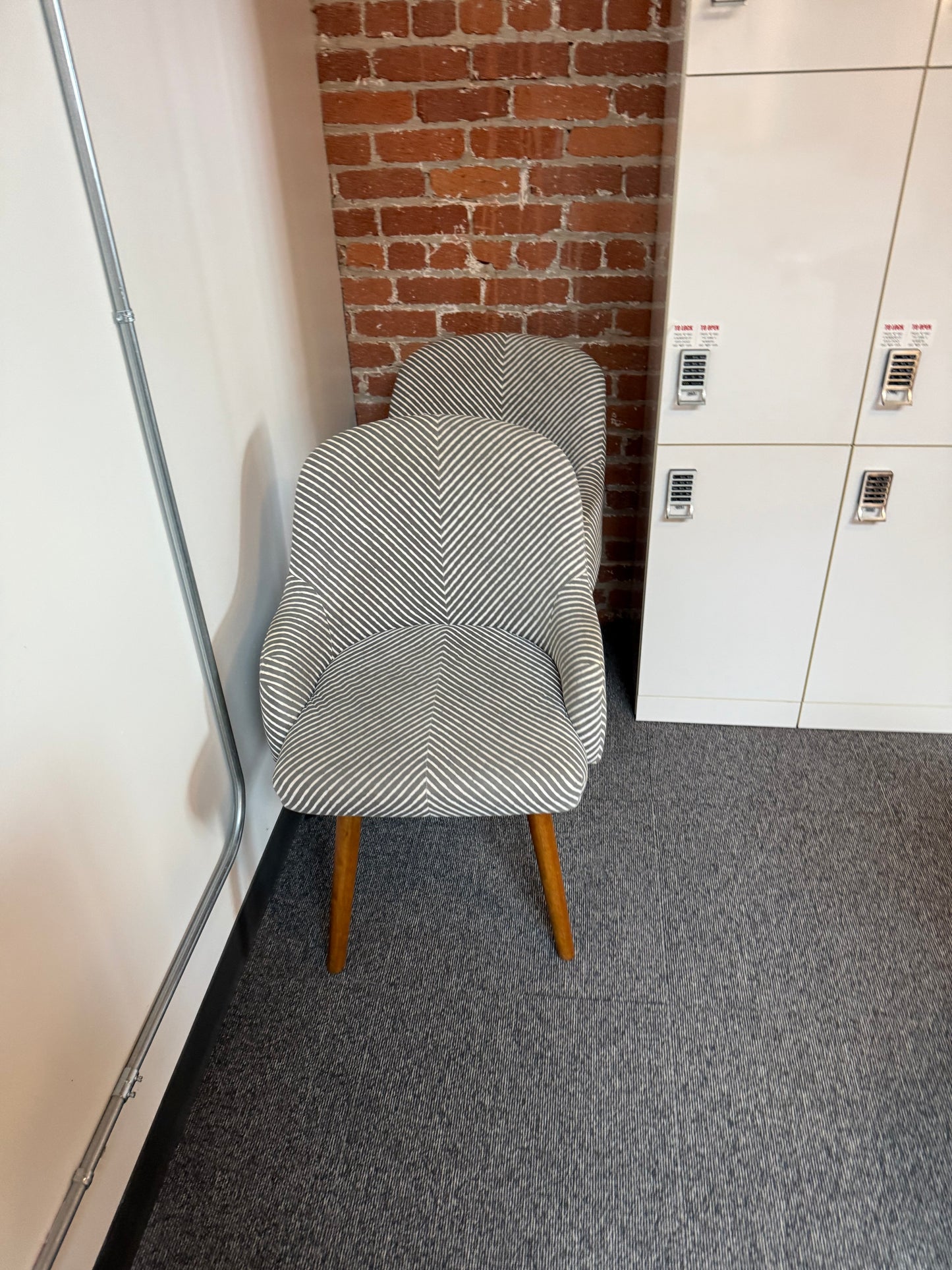Striped west elm swivel chairs